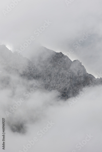 morning fog in the julian alps, italy