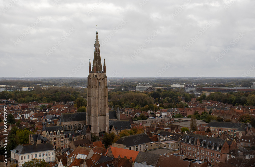 Panoramic Aerial View of Bruges with Historic Church of Our Lady and Picturesque Rooftops