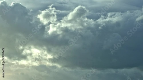 Timelapse of cumulolimbus clouds forming and moving in a stormy sky as it slowly gets dark.timelapse of cumulus and cumulolimbus clouds forming and moving in a stormy sky as it slowly gets dark.