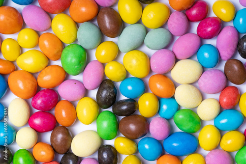 A Colorful Collection of Delicious Candy Eggs. A close up of a bunch of candy eggs
