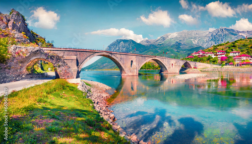 captivating summer view of old mes bridge impressive morning landscape of shkoder colorful outdoor scene of albania europe traveling concept background photo