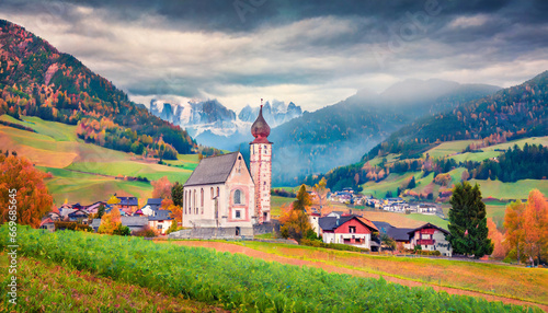 astonishing autumn view of san genesio and santa barbara churches gloomy morning scene of tolpei village province of bolzano south tyrol italy beauty of countryside concept background