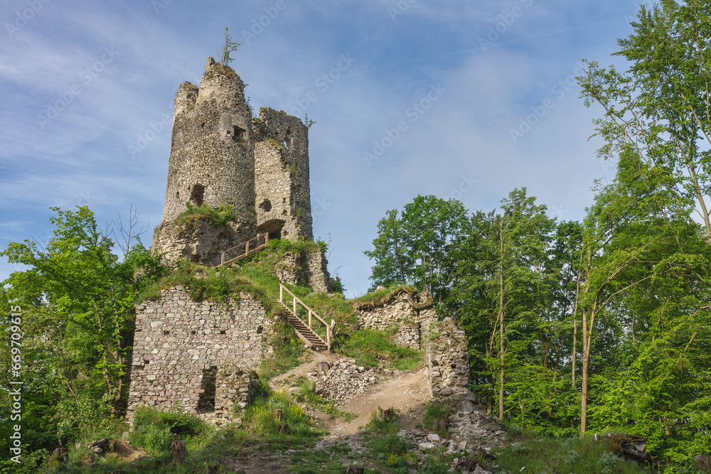 Ruins of medieval castle Starhrad , Slovakia, Mala Fatra, spring day, blue sky with clouds.