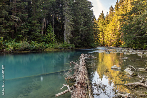 Serenity at a turquoise river in the wilderness of British Columbia, Canada photo