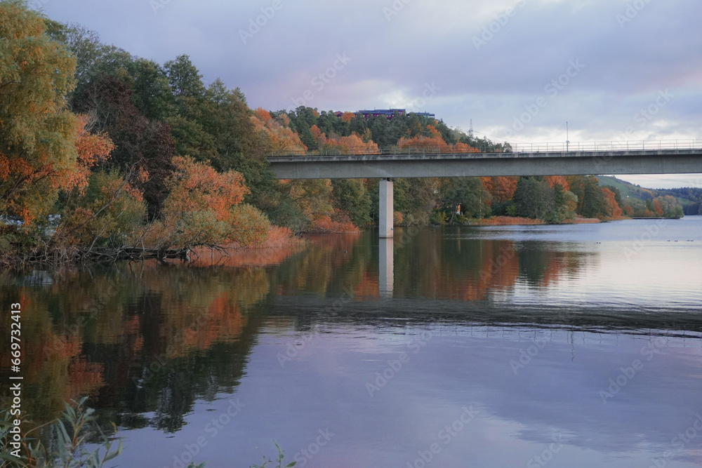 Scenic view of bridge over river against sky