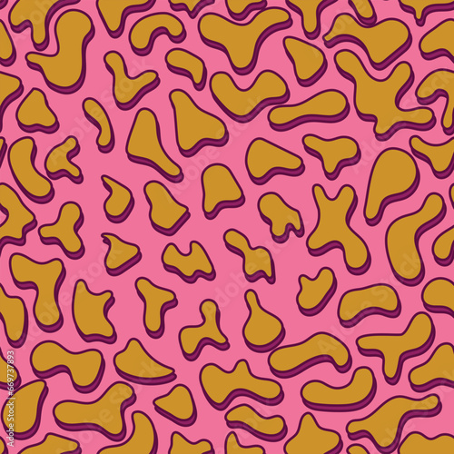 Bright seamless pattern. Yellow spots of abstract shape on a bright pink background. It resembles a cheetah. Vector illustration.