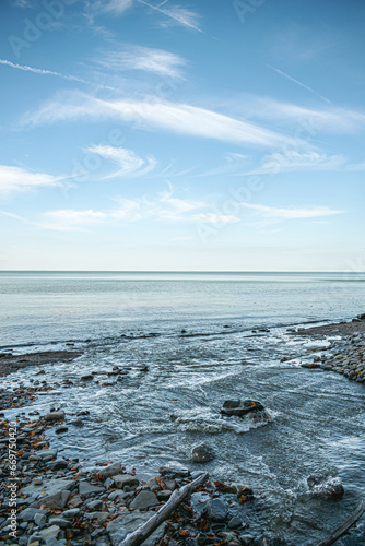 Lake Erie Rocky Beach Under Bluffs with Stream.