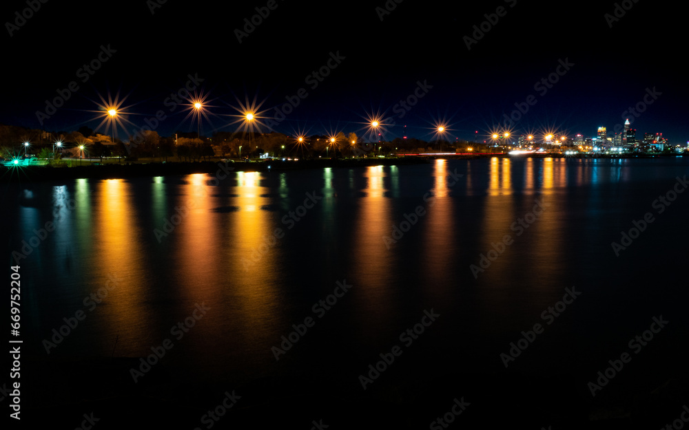 Streetlamps Reflecting in Lake Erie with Cleveland in the Distance