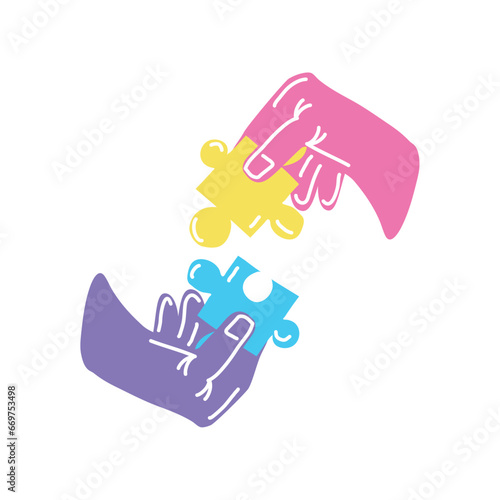 asperger hand with puzzles