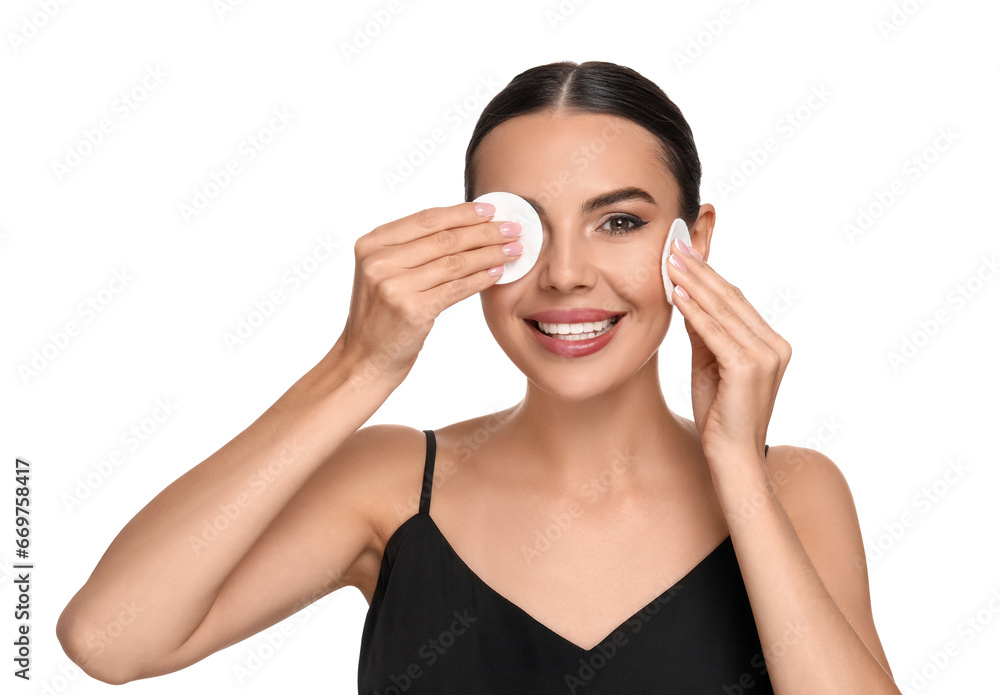 Beautiful woman removing makeup with cotton pads on white background Beautiful woman removing makeup with cotton pads on white background