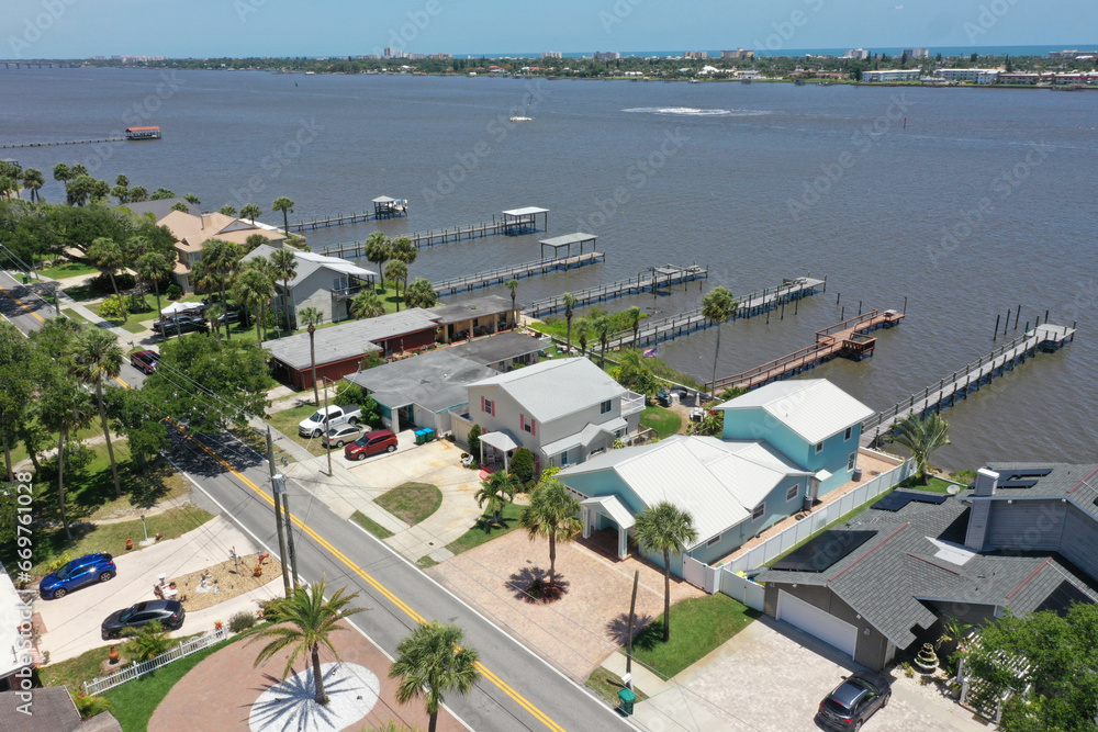Aerial of Halifax River (Intracoastal Waterway ) front homes with boat docks, Daytona Beach, Florida, USA.	
