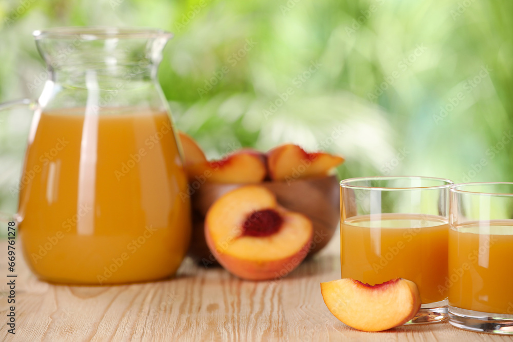 Tasty peach juice and fresh fruits on wooden table outdoors, closeup. Space for text Tasty peach juice and fresh fruits on wooden table outdoors, closeup. Space for text
