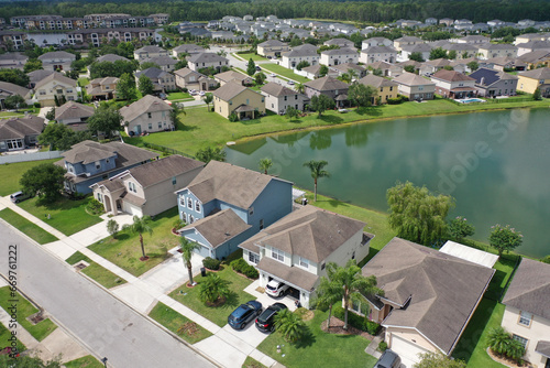 Aerial view of a Florida residential lakefront neighborhood, Port Orange, Florida, USA.