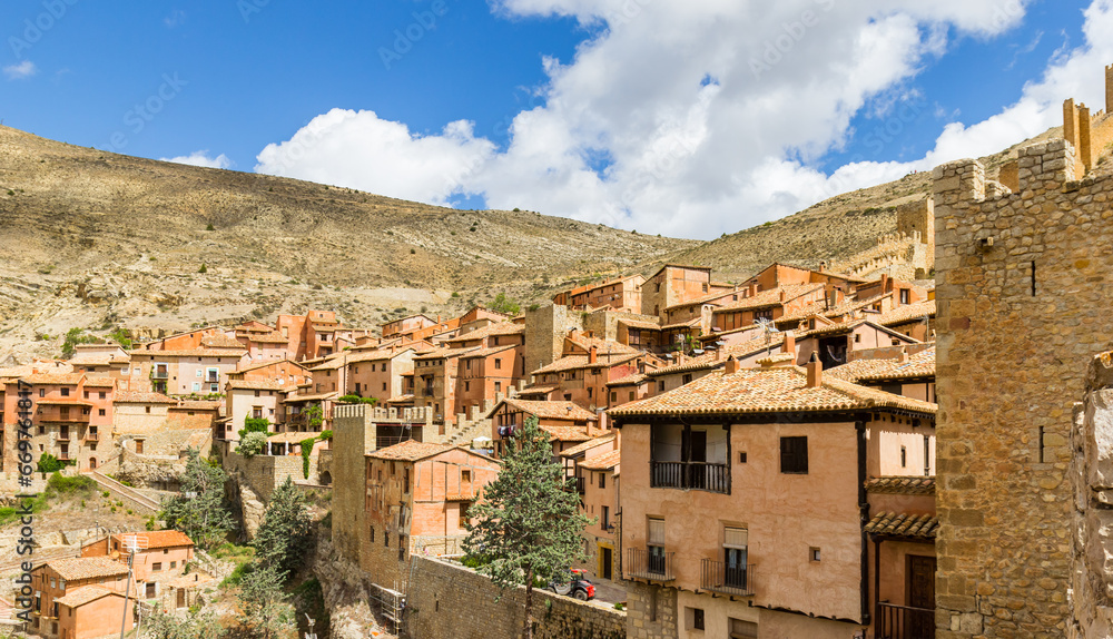 Old houses on the hill in historic town Albarracin, Spain