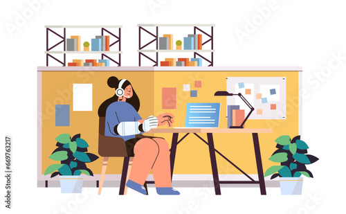 disabled woman call center agent with replaced robotic arm working on laptop chatting with clients customer service people with disabilities concept