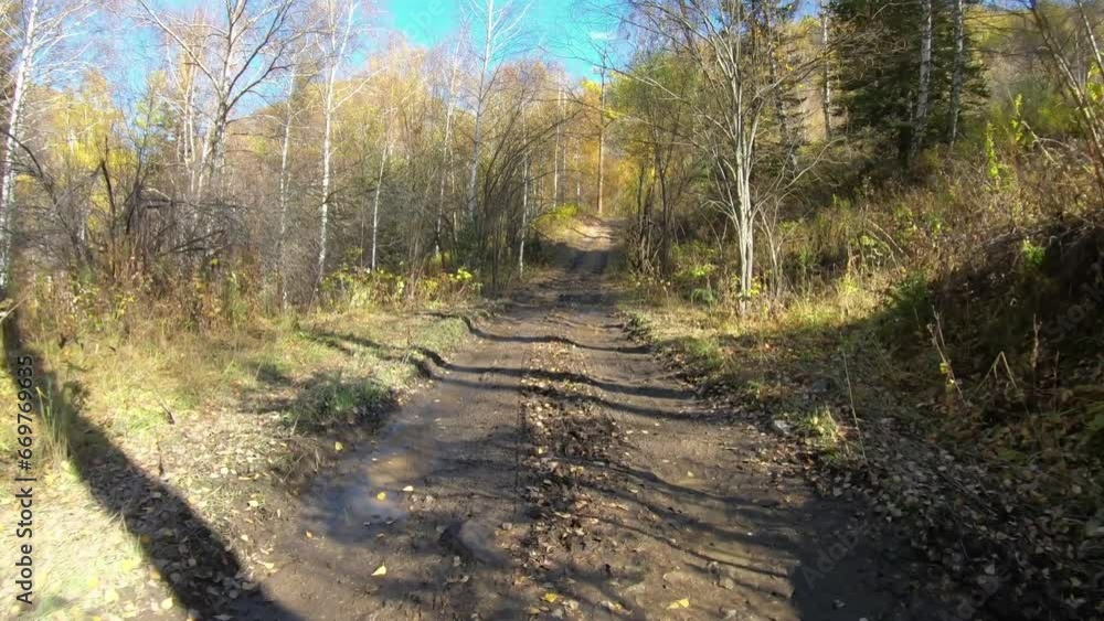 Video of driving along muddy mountain road along Altai river Kumir in Autumn. Video of driving along muddy mountain road along Altai river Kumir in Autumn.
