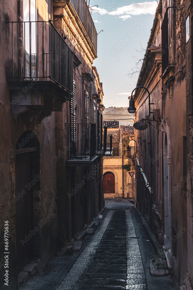 Fototapeta premium The narrow streets of the baroque style city of Modica, Sicily, Italy