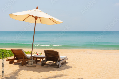 Fototapeta Naklejka Na Ścianę i Meble -  lounge chairs on the beach