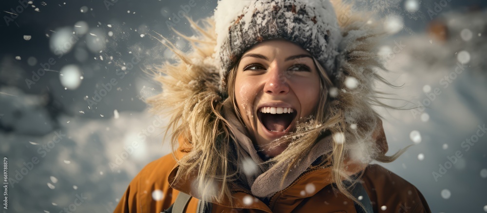 Joyful female snowboarder enjoying winter in ski resort Joyful female snowboarder enjoying winter in ski resort