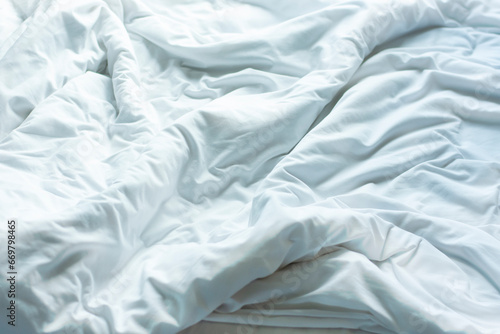 White sheets, wrinkled duvets, crumpled satin blankets. Duvets are used in hotels, resorts, or within the home for wrinkled bedding after a good night's sleep.