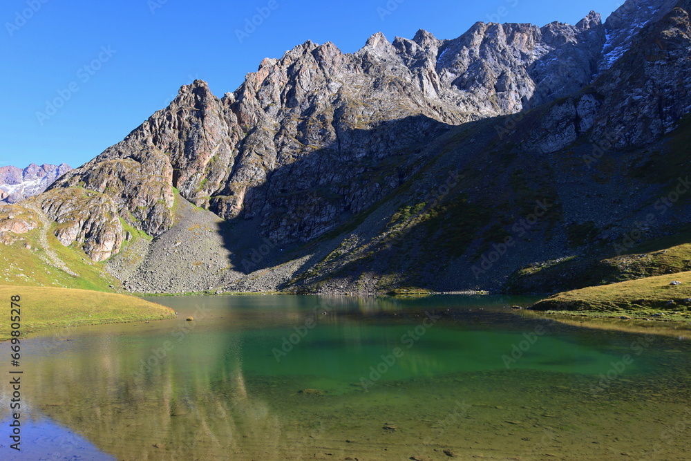 Ailampa lake located on Ak-Suu Traverse trek next to Jyrgalan and Karakol in Kyrgyzstan