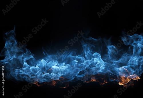 spark of blue flame isolated in balck background