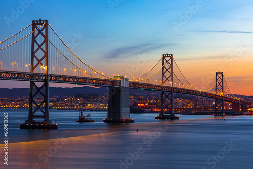San Francisco Bay Bridge West Span During Colorful Sunset photo