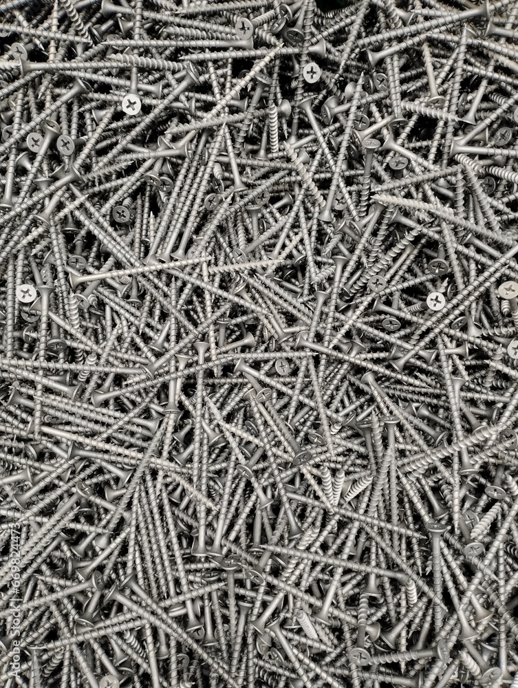 placer of iron bolts, construction fasteners, industrial background placer of iron bolts, construction fasteners, industrial background