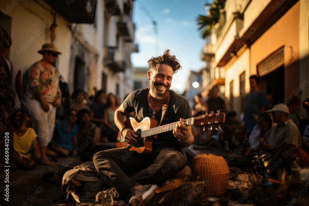 Male musician playing guitar on the street among a crowd of street musicians