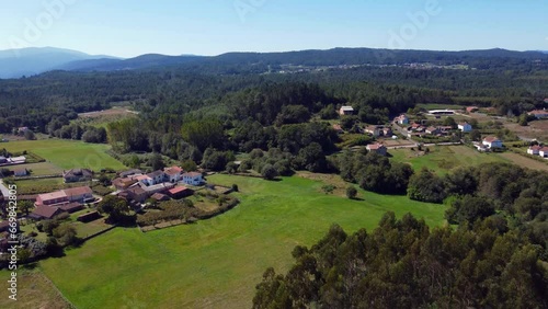 Agroforestry landscape, conifers and deciduus species in rural areas, terras de compostela, Stock Footage Compilation: Horses, Fields, and Galician Villages photo