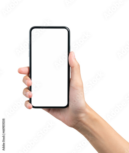 Hand holding the black smartphone with blank screen on background.