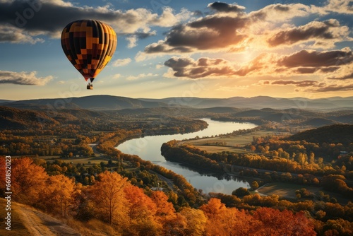 Hot air balloon over river on sunset. Travel, freedom, adventure, exploration, extreme concept.