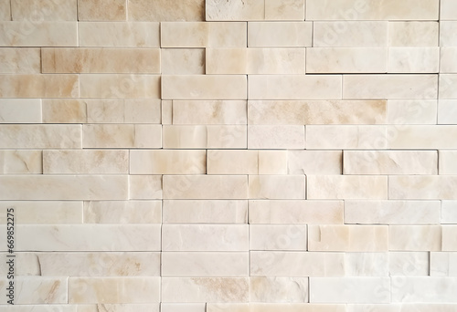 The backdrop is a white brick wall  adorned with captivating beige abstract marble tiles.