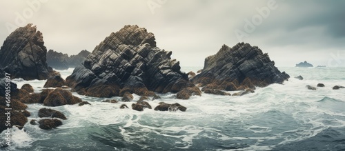Treacherous rocks in the cloudy ocean
