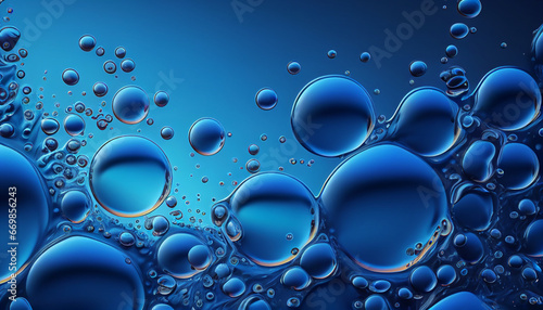 Several air bubbles in a blue liquid background photo