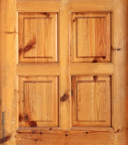 Detail of window shutter with square elements and beautiful wooden texture