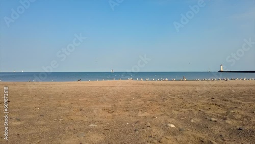 Timelapse  shot of the light houses at Sodus point New York vacation spot at the tip of land on the banks of Lake Ontario. photo