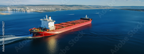 Large Bulk Carrier Ship at sea, Aerial image.