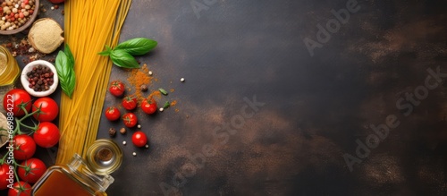 Italian food concept Spaghetti ingredients on rustic backdrop