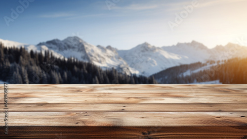 empty wooden table top with blurred background on the mountains
