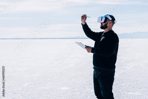 Canvas Print Male architect constructing city project on an empty site