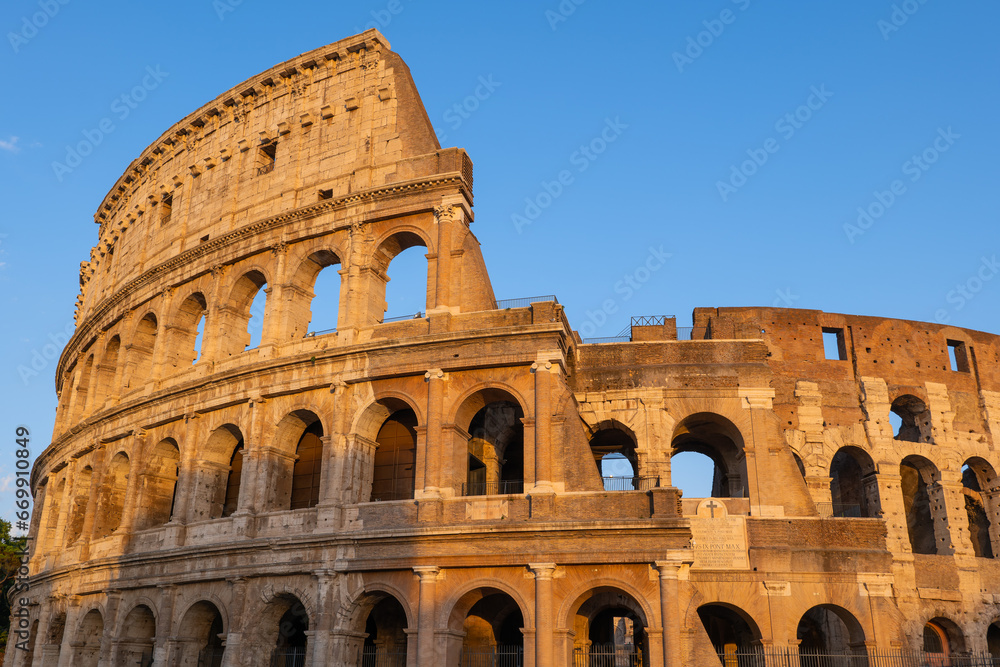 Ancient Colosseum In Rome At Sunset