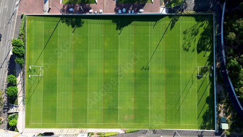 Drone aerial bird's-eye view of football NRL rugby oval field training facility goal post grass park sports fitness arena road street Sydney Olympic Park Homebush Bay NSW Australia 4K photo