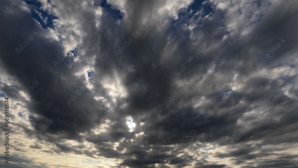 nice cloudscape of sky with heavy rain or snow clouds bg - photo of nature