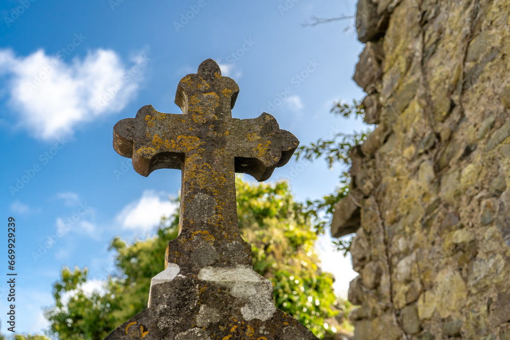 Old Irish cemetery with traditional Celtic cross