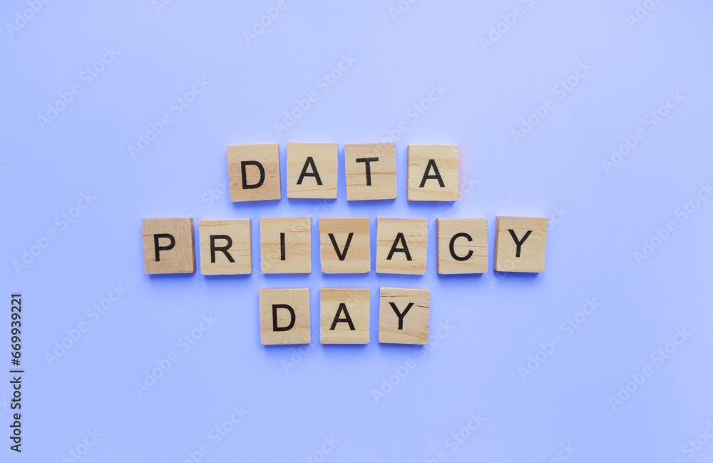 January 28, Data Privacy Day, minimalistic banner with the inscription in wooden letters January 28, Data Privacy Day, minimalistic banner with the inscription in wooden letters