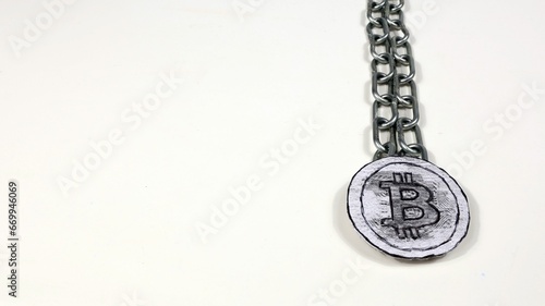 Popular cryptocurrency most famous coin in the world bitcoin chained on white background.