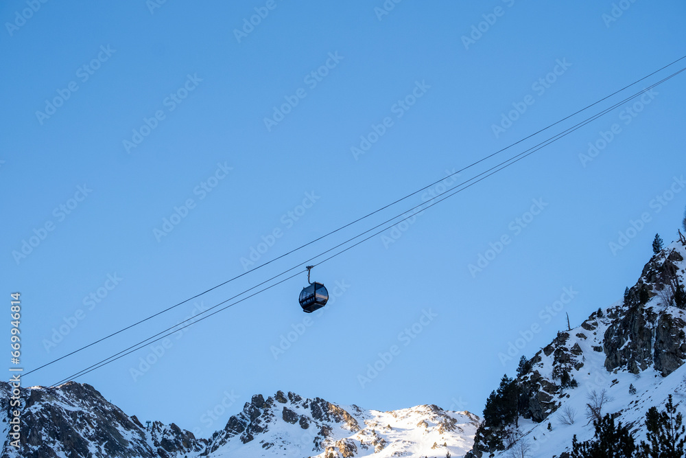 Winter journey unfolds cable car amid Andorra's snowy peaks alpine wonder Winter journey unfolds cable car amid Andorra's snowy peaks alpine wonder