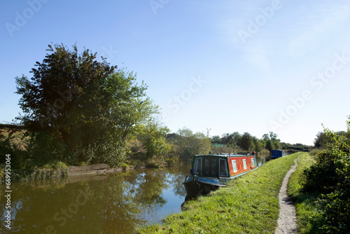 Fototapeta Moored narrow boats on the Trent and Mersey canal in Cheshire UK