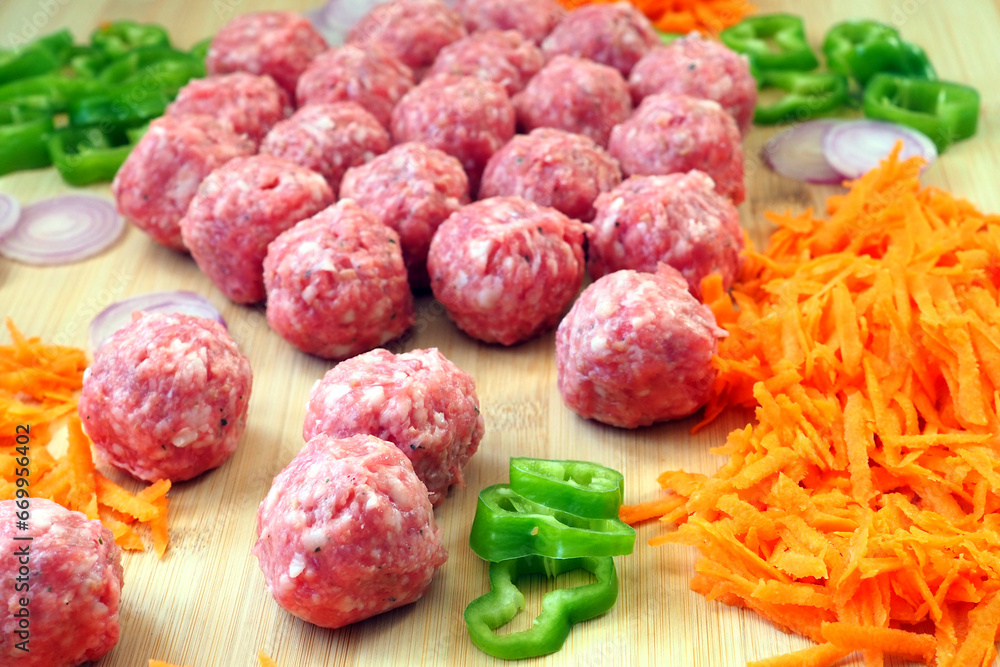 Raw Meatballs and Ingredients for Spanish Tapas